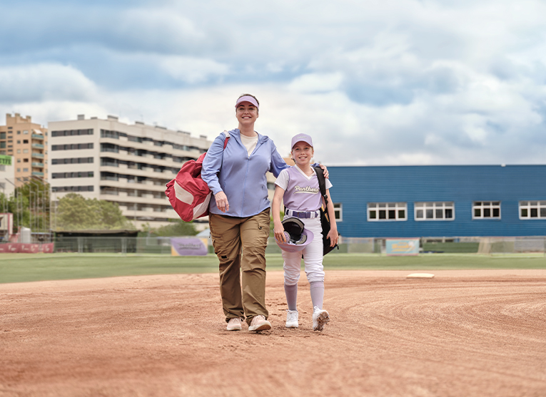 Judy and her daughter playing softball
